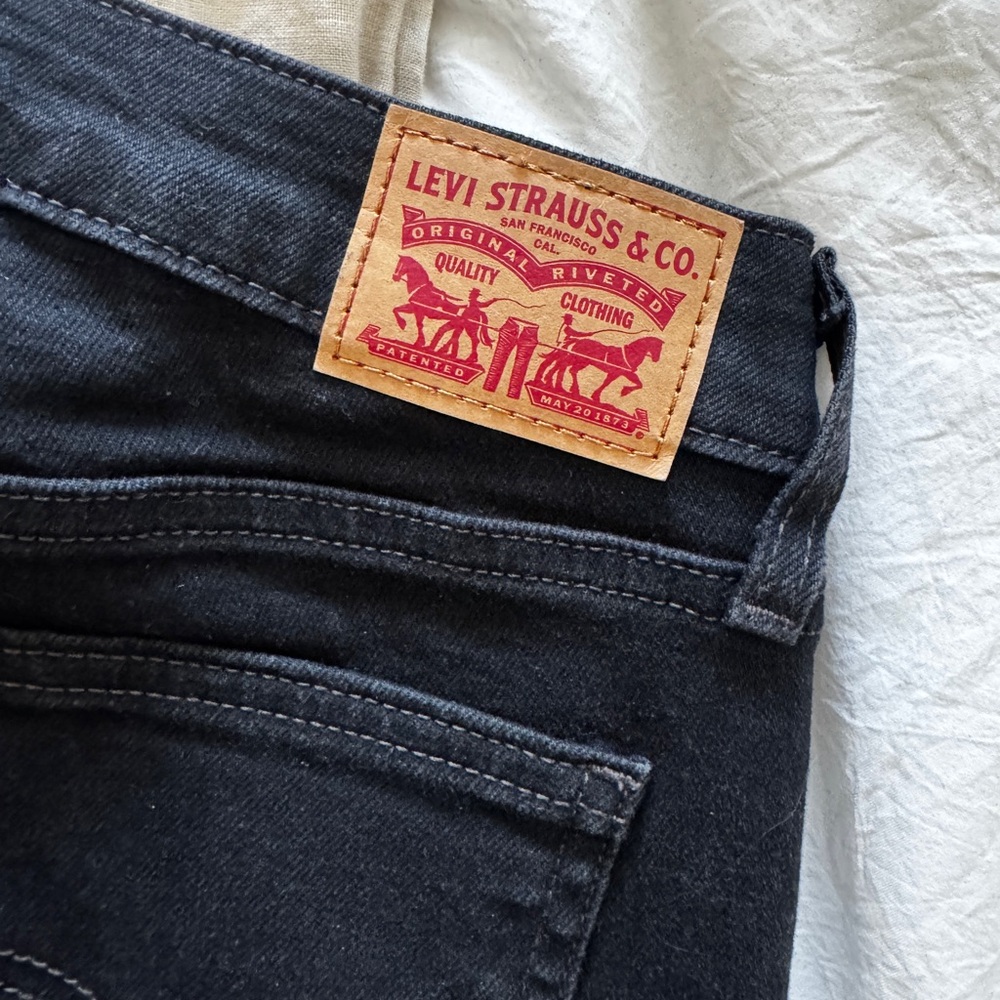 Levi's woman super low bootcut jeans black size 28